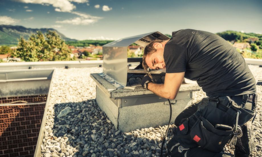 A person doing chimney service and repair 